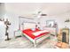 Bright bedroom with white walls, light wood floors, and neutral furniture at 4735 Monterrey Ave, Las Vegas, NV 89121