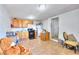 Cozy kitchen features tile flooring, standard appliances and wooden cabinetry at 4735 Monterrey Ave, Las Vegas, NV 89121