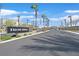 Palm trees and landscape surround the Falcon Ridge entrance. The community is well maintained at 4932 Chidlaw Ave # 2, Las Vegas, NV 89115