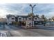 Gated community entrance to The Keys featuring well-maintained landscaping and secure access for residents and visitors at 5151 Lindell Rd # 103, Las Vegas, NV 89118