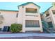 The exterior view of the condo showcases balconies and well-maintained landscaping, highlighting outdoor living spaces at 5151 Lindell Rd # 103, Las Vegas, NV 89118