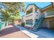 Exterior showcasing the building with staircase access and well-kept landscaping, offering a desirable living space at 5151 Lindell Rd # 103, Las Vegas, NV 89118