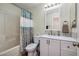 The updated bathroom has modern fixtures, and a shower-tub combination at 5224 Jose Ernesto St, North Las Vegas, NV 89031