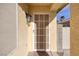 Inviting front entrance with a secure screen door, decorative exterior wall, and pleasant welcome mat at 5224 Jose Ernesto St, North Las Vegas, NV 89031
