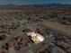 Areal view of the home shows desert landscaping and proximity to surrounding mountains at 5450 Barnwood Ct, Pahrump, NV 89061