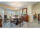 Dining room featuring a round table, bay window, and decorative furnishings at 5450 Barnwood Ct, Pahrump, NV 89061
