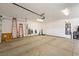 Spacious two-car garage with ladders, overhead storage, and room for vehicles and storage at 5450 Barnwood Ct, Pahrump, NV 89061