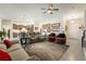 Spacious living room seamlessly connects to the dining and kitchen areas, ideal for entertaining and Gathering gatherings at 5450 Barnwood Ct, Pahrump, NV 89061