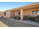 This covered patio provides ample space for outdoor dining and entertaining at 5450 Barnwood Ct, Pahrump, NV 89061
