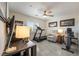 Bright workout room equipped with a treadmill, exercise bike, and seating at 5450 Barnwood Ct, Pahrump, NV 89061