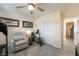 Bright workout room equipped with a treadmill, exercise bike, and recliner at 5450 Barnwood Ct, Pahrump, NV 89061