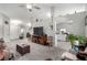 Inviting living room featuring a ceiling fan, modern furnishings, and an open layout at 5552 Singing Hills Dr, Las Vegas, NV 89130
