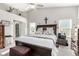 Spacious main bedroom featuring high ceilings, a ceiling fan, and neutral decor with natural light at 5552 Singing Hills Dr, Las Vegas, NV 89130