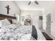 Spacious main bedroom featuring high ceilings, a ceiling fan, and neutral decor with carpet floors at 5552 Singing Hills Dr, Las Vegas, NV 89130