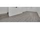 Spacious basement features new vinyl floors, white painted walls and trim and a small window for natural light at 7060 S Valley View Blvd, Las Vegas, NV 89118