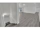 Bright stairway descends to neutral flooring and a spacious living area at 7060 S Valley View Blvd, Las Vegas, NV 89118