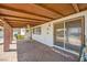 Back porch includes a patio, ceiling fan, and view of the back yard at 7079 Laredo St, Las Vegas, NV 89117