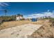 Expansive backyard featuring a concrete slab and potential for outdoor recreation and landscaping at 7079 Laredo St, Las Vegas, NV 89117