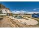 Backyard featuring a swimming pool, gazebo, and ample space for outdoor activities at 7079 Laredo St, Las Vegas, NV 89117