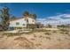 Spacious backyard with a pool, gazebo, and a two-story home at 7079 Laredo St, Las Vegas, NV 89117