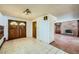 The entryway boasts tile floors and access to the living room with a fireplace at 7079 Laredo St, Las Vegas, NV 89117