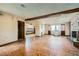 Bright living room showcasing wood beam, and large windows that provide ample natural light at 7079 Laredo St, Las Vegas, NV 89117