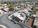 Aerial view of home featuring solar panels, a backyard pool, and a covered patio in a residential neighborhood at 7621 Gosport Ave, Las Vegas, NV 89131