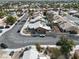 Overhead view of a residential area with swimming pools, landscaping, and well-maintained streets, located in Nevada at 7621 Gosport Ave, Las Vegas, NV 89131