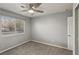 Bedroom featuring carpet, gray walls, a ceiling fan, and a window with blinds at 7621 Gosport Ave, Las Vegas, NV 89131