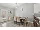 Cozy dining area with wood floors and light neutral tones at 7621 Gosport Ave, Las Vegas, NV 89131