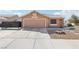 Charming single-story home with low-maintenance desert landscaping and two car garage in a quiet neighborhood at 7621 Gosport Ave, Las Vegas, NV 89131