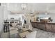Bright, open-concept living space with dining area and kitchen at 7621 Gosport Ave, Las Vegas, NV 89131