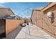 Spacious covered patio, currently used for home gym equipment, offering potential for versatile outdoor living at 7621 Gosport Ave, Las Vegas, NV 89131