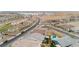 Beautiful aerial view of a residential area with swimming pool and well-manicured landscapes at 856 Watford Pl, Henderson, NV 89011