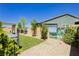 Beautiful backyard with gravel and artificial turf, perfect for relaxing and entertaining outdoors at 856 Watford Pl, Henderson, NV 89011
