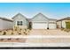 Charming single-story home with a three-car garage and well-maintained landscaping at 856 Watford Pl, Henderson, NV 89011