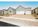 Attractive single-story home with a three-car garage and a spacious brick-paved driveway at 856 Watford Pl, Henderson, NV 89011