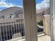 View from balcony of neighboring homes with a blue sky backdrop at 8680 Horizon Wind Ave # 101, Las Vegas, NV 89178