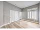 Bedroom with white trim, grey walls, and window shutters provides natural light and a bright feel at 8864 La Manga Ave, Las Vegas, NV 89147
