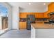 Charming kitchen with stainless steel appliances, island, and pantry at 9071 Mount Wilson St, Las Vegas, NV 89113