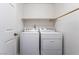 Modern laundry room with standard washer and dryer units at 9071 Mount Wilson St, Las Vegas, NV 89113