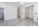 Living room features gray flooring and staircase at 9071 Mount Wilson St, Las Vegas, NV 89113