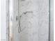 Tiled shower with a rainfall shower head and a built-in niche at 9071 Mount Wilson St, Las Vegas, NV 89113