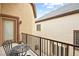 This balcony features a bistro table and chairs, perfect for morning coffee or enjoying city views at 9172 Tudor Park Pl, Las Vegas, NV 89145