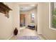 Inviting foyer with tile flooring, ample natural light, and stylish decor at 9172 Tudor Park Pl, Las Vegas, NV 89145