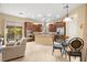 Well-equipped kitchen with granite countertops, stainless steel appliances, and an eat-in kitchen at 9172 Tudor Park Pl, Las Vegas, NV 89145