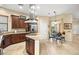 Stylish kitchen with stainless steel appliances, granite countertops, and a breakfast nook at 9172 Tudor Park Pl, Las Vegas, NV 89145