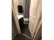Cozy bathroom with tiled floors, dark cabinet vanity and classic fixtures at 9359 Brigham Ave, Las Vegas, NV 89178