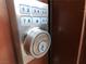 Close up of the digital front door lock at 9359 Brigham Ave, Las Vegas, NV 89178