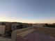 Panoramic view of community rooftops and mountains during sunset at 9359 Brigham Ave, Las Vegas, NV 89178